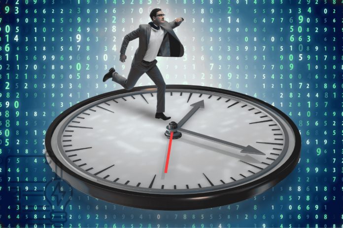 Man in suit running on a clock face depicting the need for energy audit for sales leaders